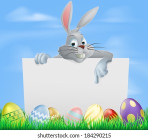 The Easter bunny pointing at a sign with Easter eggs background