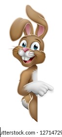 The Easter bunny rabbit cartoon character peeking around a sign and pointing at it