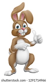 Easter bunny rabbit cartoon character giving a thumbs up and pointing