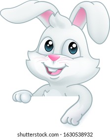 Easter bunny rabbit cartoon character peeking over a sign background and pointing down at it