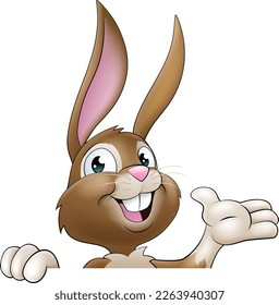An Easter bunny rabbit cartoon character peeking around a sign