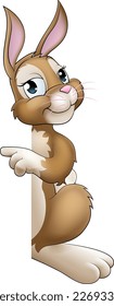 Un personaje de caricatura de conejo de Pascua mirando alrededor de un cartel