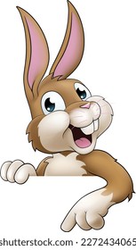 An Easter bunny rabbit cartoon character peeking around a sign
