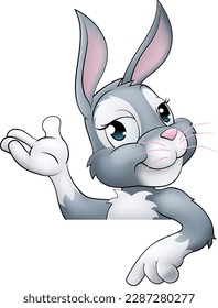 An Easter bunny rabbit cartoon character peeking around a sign