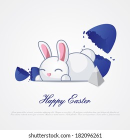 Easter bunny rabbit with colored Easter eggs 