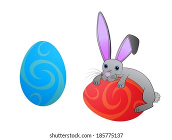 Easter bunny rabbit with decorated Easter eggs