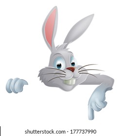 An Easter bunny rabbit pointing down at a banner or sign