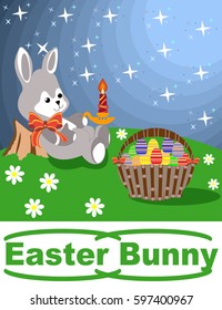 Easter bunny resting in a meadow on a background of  starry night sky