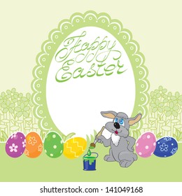 Easter Bunny says congratulations. Easter rabbit paints egg.