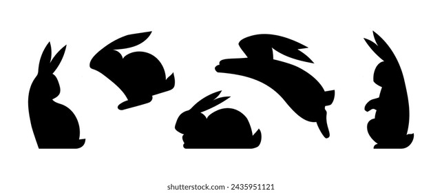 Easter bunny set. Black silhouettes of rabbits in different poses isolated on white background. Vector illustration in flat style