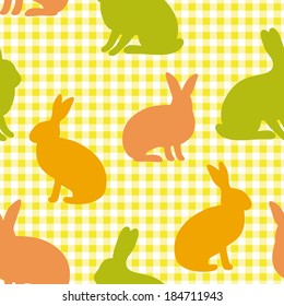 Easter bunny silhouettes on gingham yellow background, seamless holiday pattern, spring design in warm colors