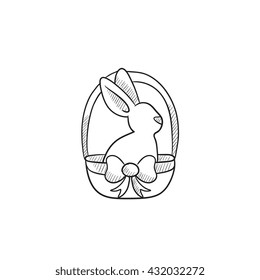 Easter bunny sitting in basket vector sketch icon isolated on background. Hand drawn Easter bunny sitting in basket icon. Easter bunny sitting in basket sketch icon for infographic, website or app.