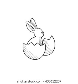Easter bunny sitting in egg shell vector sketch icon isolated on background. Hand drawn Easter bunny sitting in egg shell icon. Easter bunny in egg shell sketch icon for infographic, website or app.