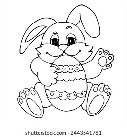 The Easter bunny is sitting holding a colored egg in its paws