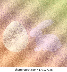 Easter Bunny sitting near Easter Egg