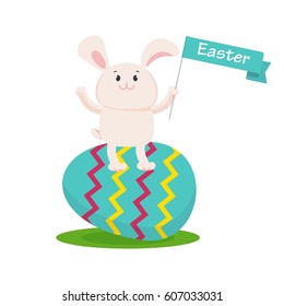 Easter bunny sitting on blue striped egg, holds bright flag in paw and smiles happily. Easter cards, decor, congratulations. Flat vector cartoon illustration. Objects isolated on a white background.