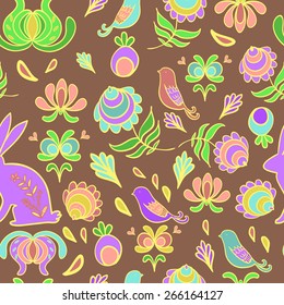 Easter Bunny in a the spring garden. Chocolate background.