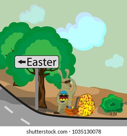 Easter bunny is standing by the shoulder with a backpack