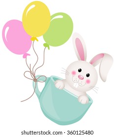 Easter bunny in teacup with balloons
