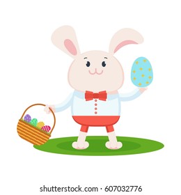 Easter bunny in white shirt, shorts, bow tie holds wicker basket with Easter eggs and smiles happily. Easter cards, decor. Flat vector cartoon illustration. Objects isolated on a white background.