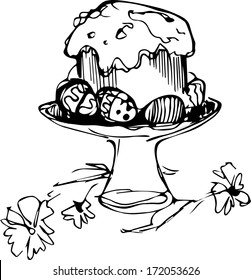 a Easter cake with eggs and flowers in a vase