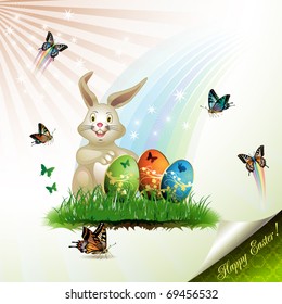 Easter card with bunny, butterflies and decorated eggs on grass