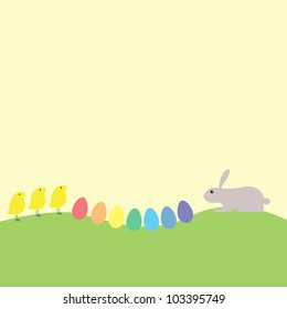 Easter card with bunny, chickens and multicolored eggs on green grass and space for your own text