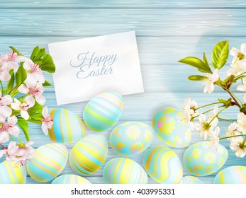 Easter card decorated with cherry blossom flowers. EPS 10 vector file included