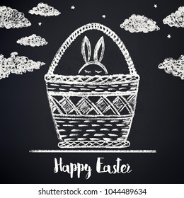 Easter card drawn in chalk. The rabbit is hiding in the basket.