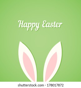 Easter card with ears of bunny on green