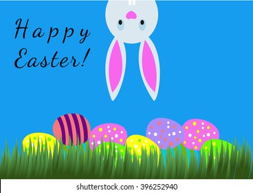 Easter card. Fun bunny on the blue background with eggs and green grass