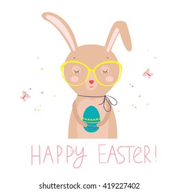 Easter card with funny rabbit and colored egg.