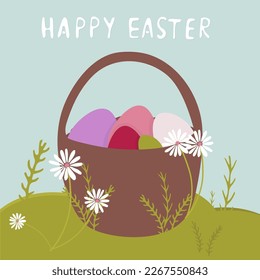 Easter card with happy easter. Basket with eggs in the meadow.
