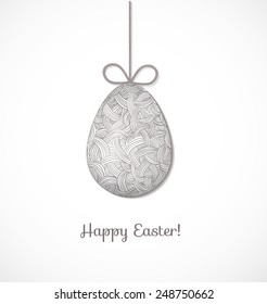 Easter card with one big ornated hanging egg on white background. Vector illustration
