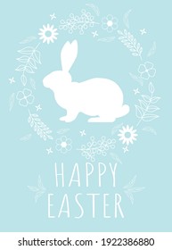 Tarjeta de Pascua con conejo y flores.