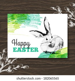 Easter card. Sketch watercolor Easter rabbit. Hand drawn illustration wooden background