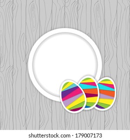 easter card template with eggs and place for inscription on the seamless wood background