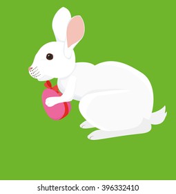 Easter cartoon rabbit with painted  egg 