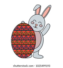 easter celebration with rabbit behind the big egg