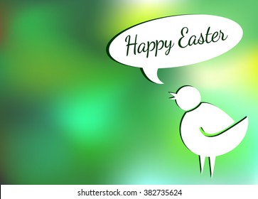 Easter chick on blurred background wishing Happy Easter