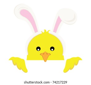 Easter chick wearing "bunny ears" peeping over the top of a blank sign.