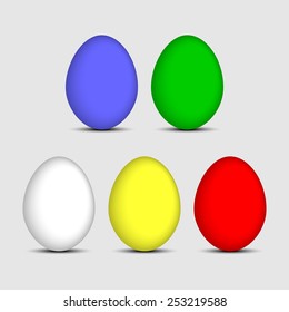 easter colored eggs in several colors on a bright background