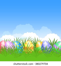 Easter colorful eggs in green grass for holidays design