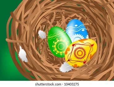Easter colorful eggs in a nest.