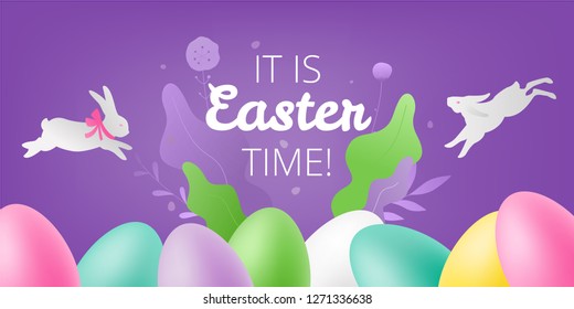 Easter colorful vector composition of painted eggs it is easter time words and two white rabbits. Easter season greetings concept.