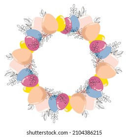 Pascua. Una corona colorida con huevos de Pascua de colores, ramas y la inscripción Feliz Pascua.