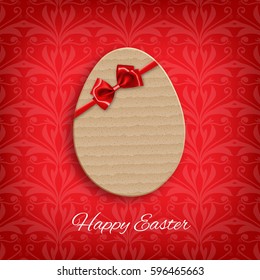 Easter concept. Cardboard easter egg with bow and ribbon. EPS10 vector