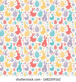 Easter concept with colourful eggs, bunnies and flowers. Seamless pattern. Vector