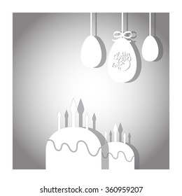 Easter cupcake with candles and three eggs