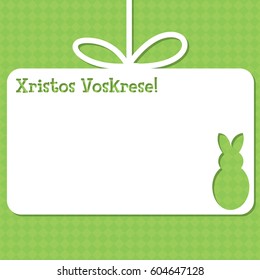 Easter cut out tag card in vector format. Words translate to "Happy Easter".